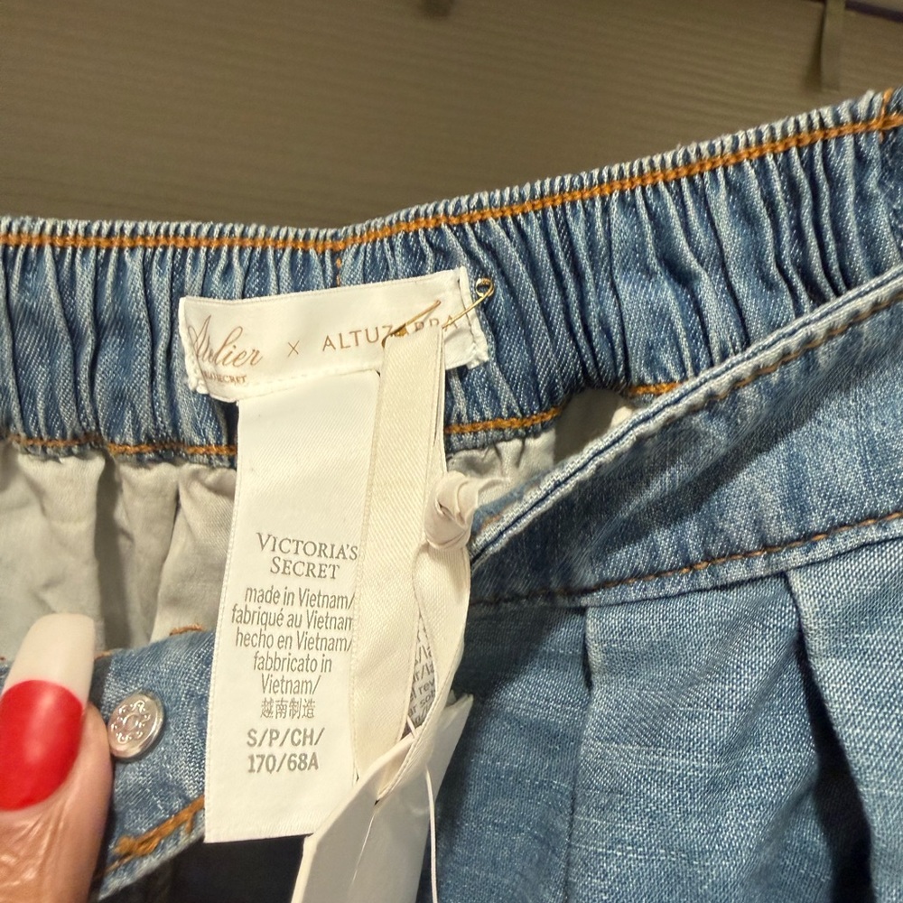 Victoria's Secret Denim Skirt with pockets zipper in the front with a button . - Picture 8 of 11